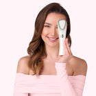 Woman holding Revi Pro+ Anti-Aging Device by Smuuv Body