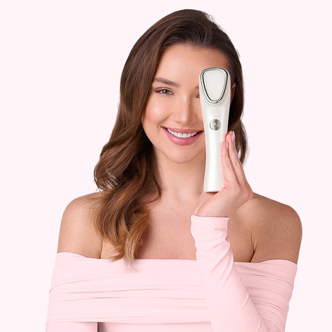 Woman holding Revi Pro+ Anti-Aging Device by Smuuv Body